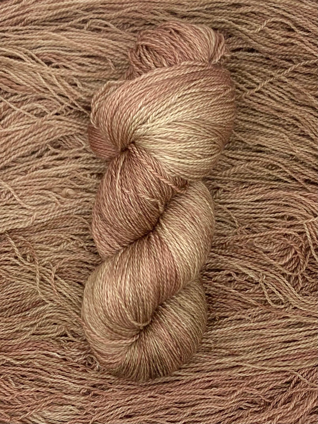 Hand dyed Superwash Merino cashmere and silk lace yarn in Rose gold brown