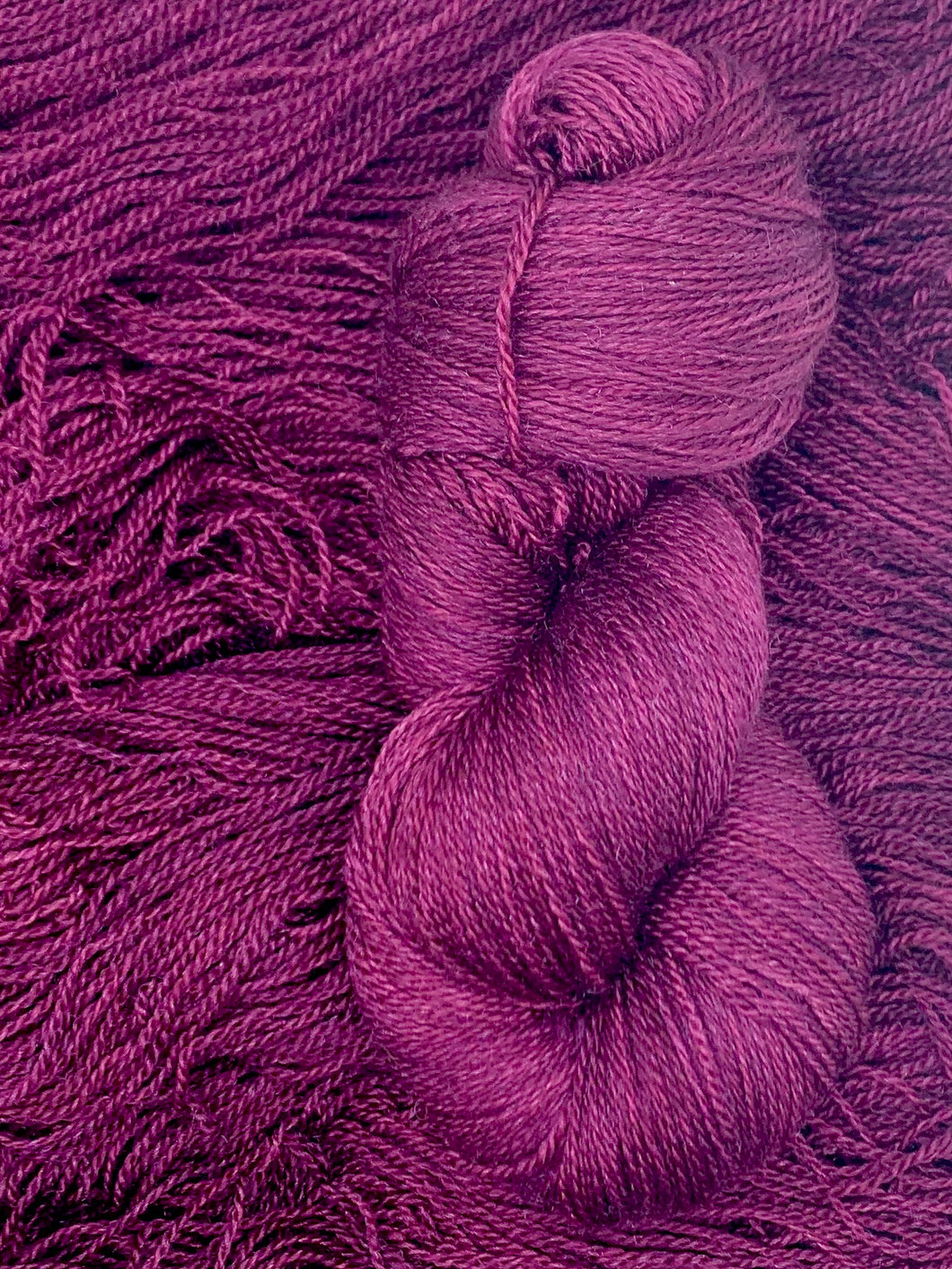 Hand dyed Superwash Merino cashmere and silk lace yarn in Deep purple maroon
