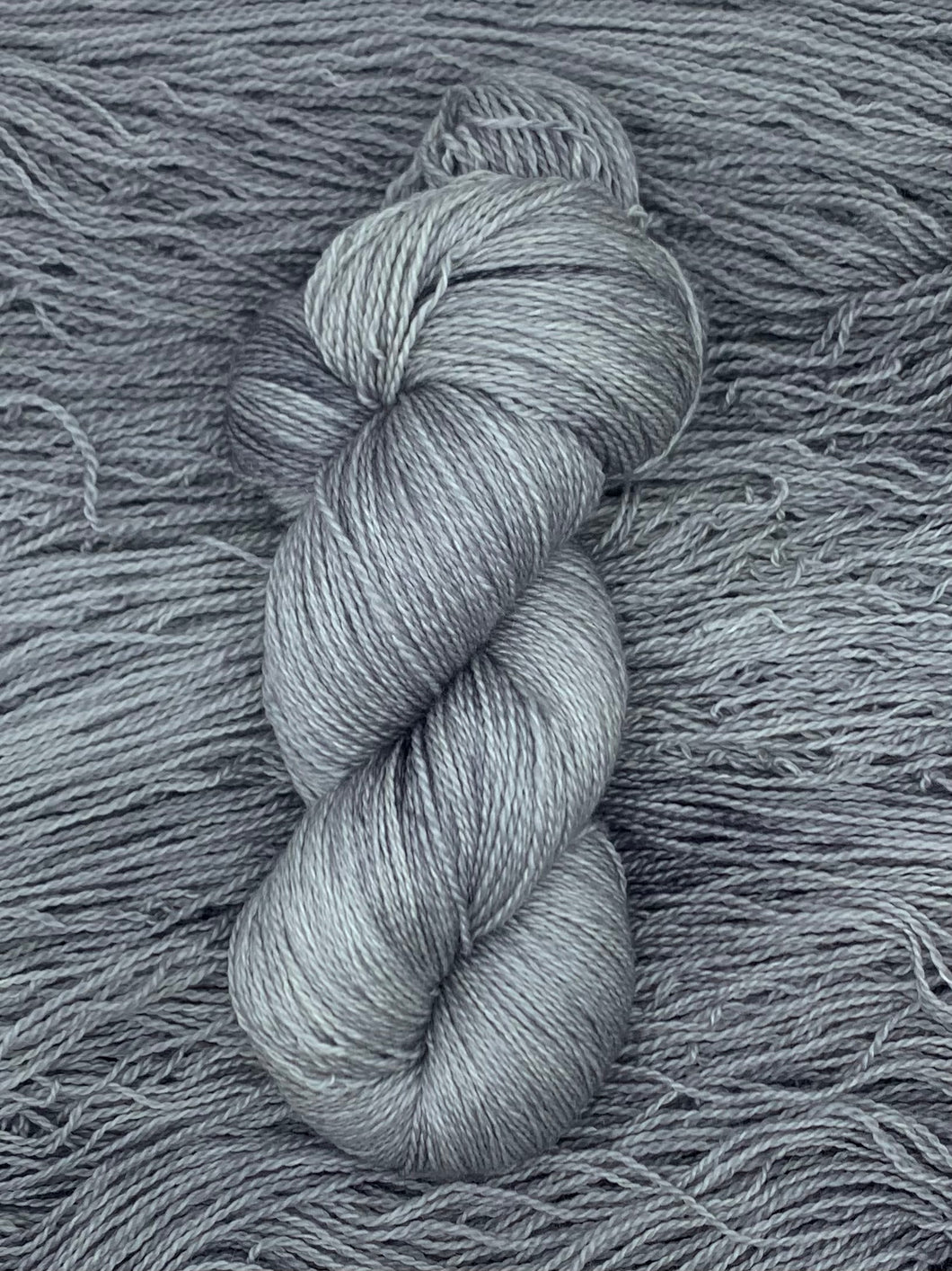 Hand dyed Superwash Merino cashmere and silk lace yarn in silver gray