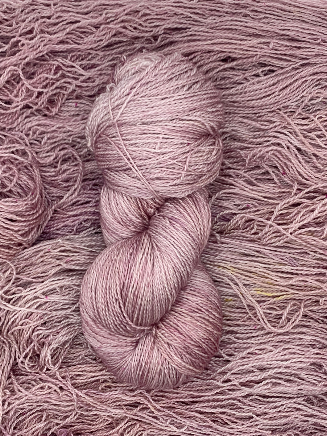 Hand dyed Superwash Merino cashmere and silk lace yarn in Soft rosey pink