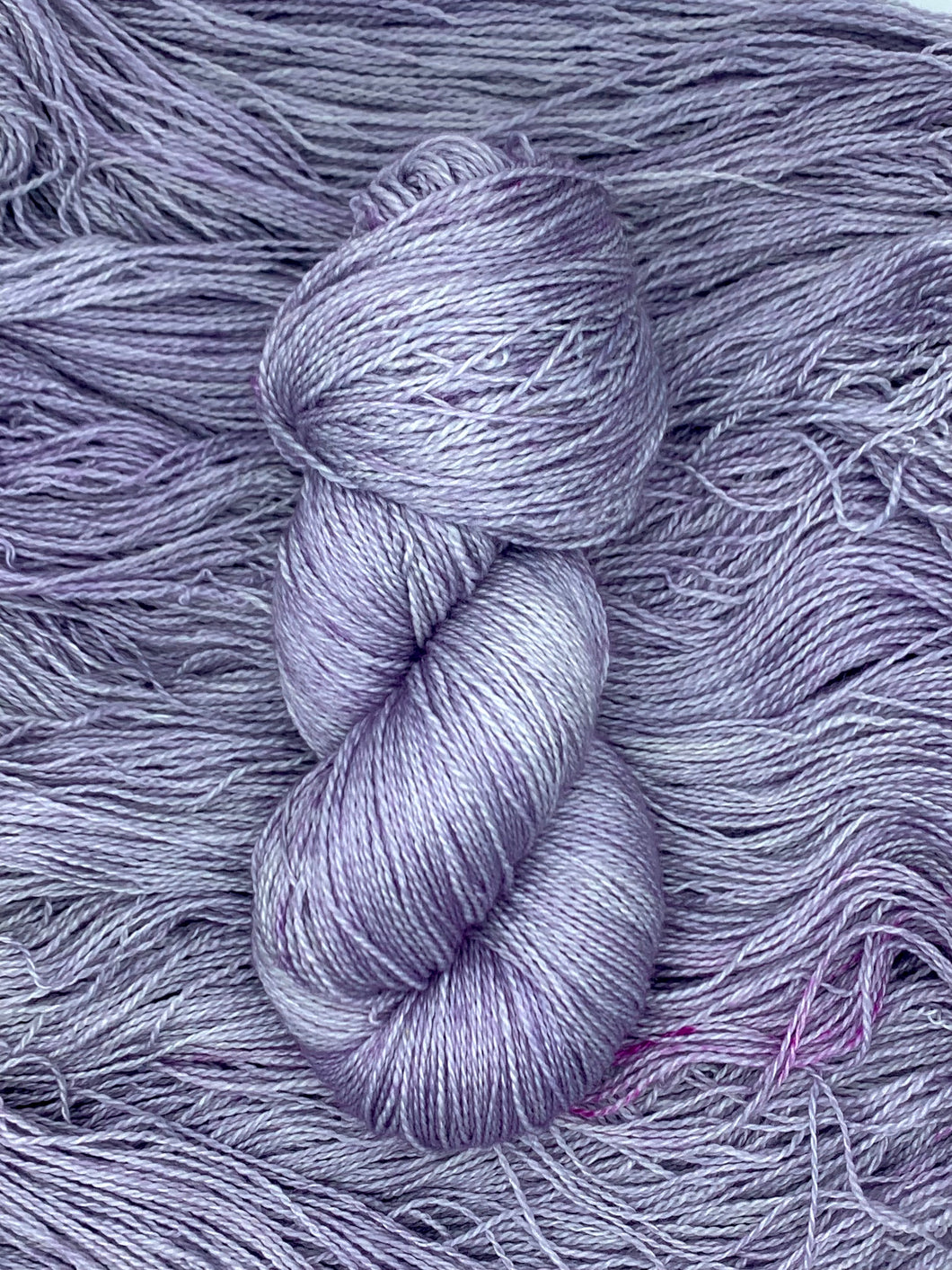 Hand dyed Superwash Merino cashmere and silk lace yarn in soft lavender purple