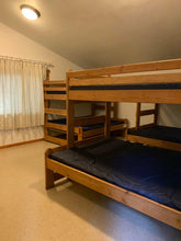 Interior Photo of the bunk beds in an enclosed cabin at the fiber arts retreat