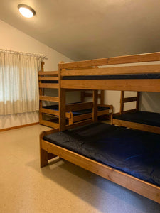 Interior Photo of the bunk beds in an enclosed cabin at the fiber arts retreat