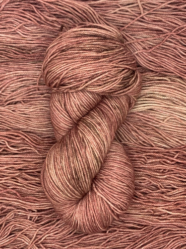 Hand Dyed Fingering Weight Superwash Merino cashmere nylon yarn in Rose Gold brown 