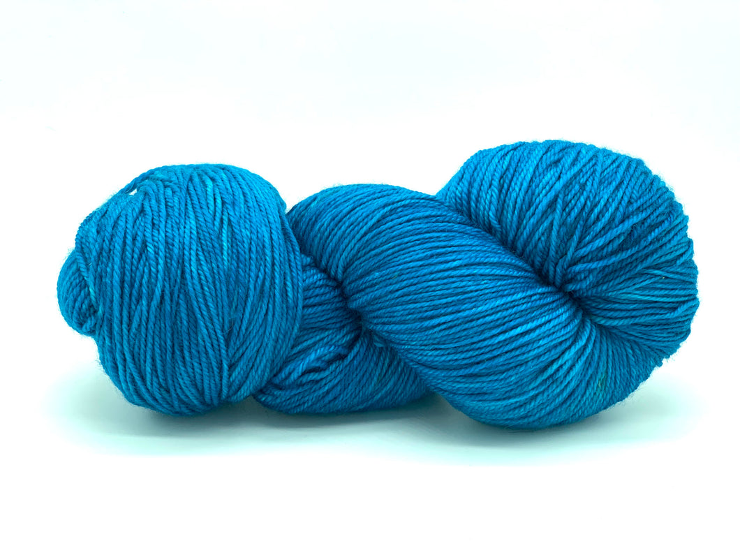 Hand Dyed Fingering Weight Superwash Merino cashmere nylon yarn in blue