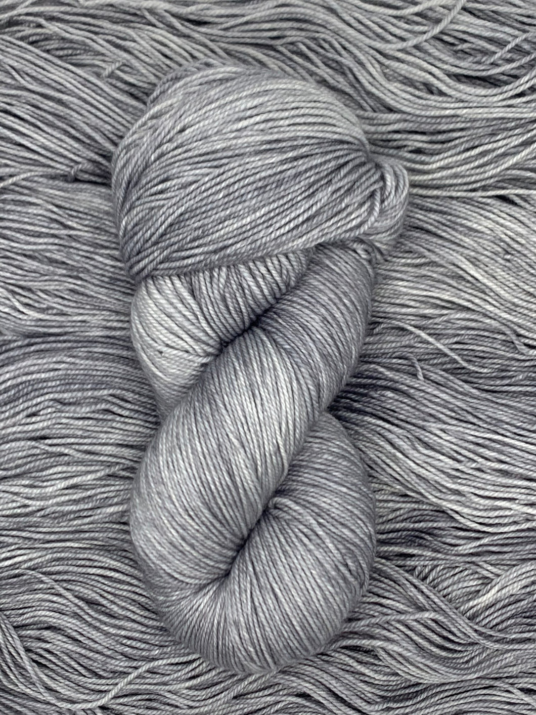 Hand Dyed Fingering Weight Superwash Merino cashmere nylon yarn in silver gray