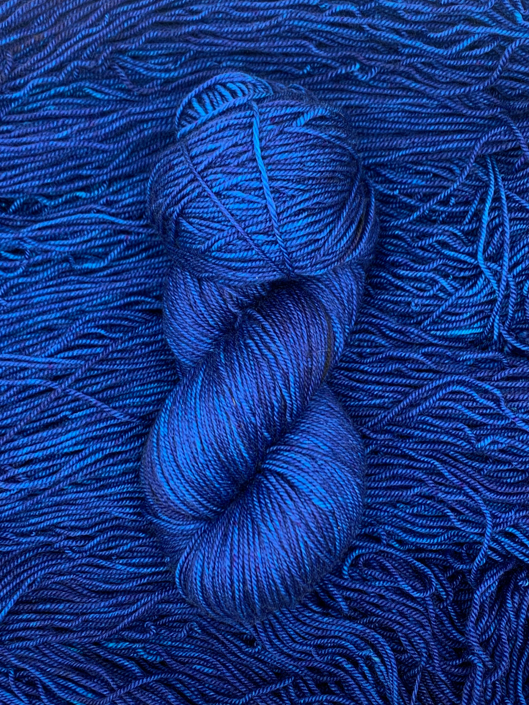 Hand Dyed Fingering Weight Superwash Merino cashmere nylon yarn in deep blue sapphire