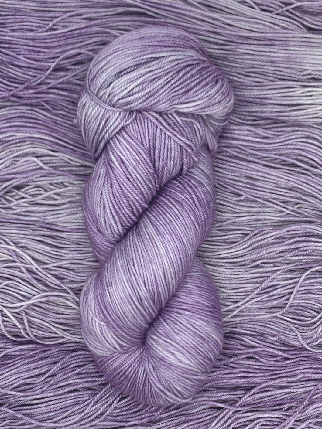 Hand Dyed Fingering Weight Superwash Merino cashmere nylon yarn in lavender purple