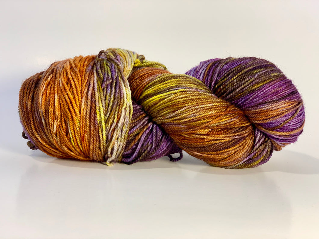 Hand Dyed Fingering Weight Superwash Merino cashmere nylon yarn variegated purple orange and yellow
