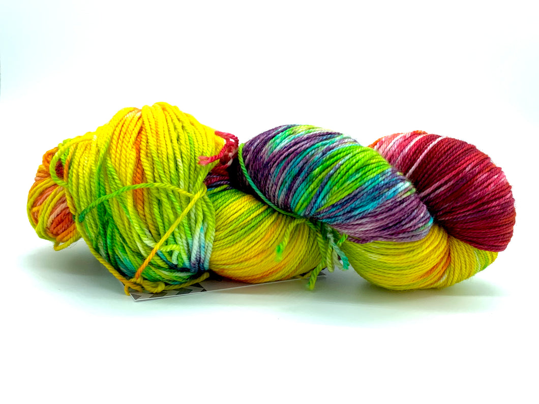Hand Dyed Fingering Weight Superwash Merino cashmere nylon yarn in rainbow