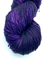 Hand Dyed Fingering Weight Superwash Merino cashmere nylon yarn in deep purple and black