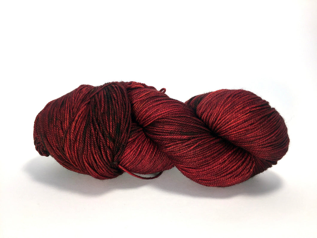 Hand Dyed Fingering Weight Superwash Merino cashmere nylon yarn in brick red and brown